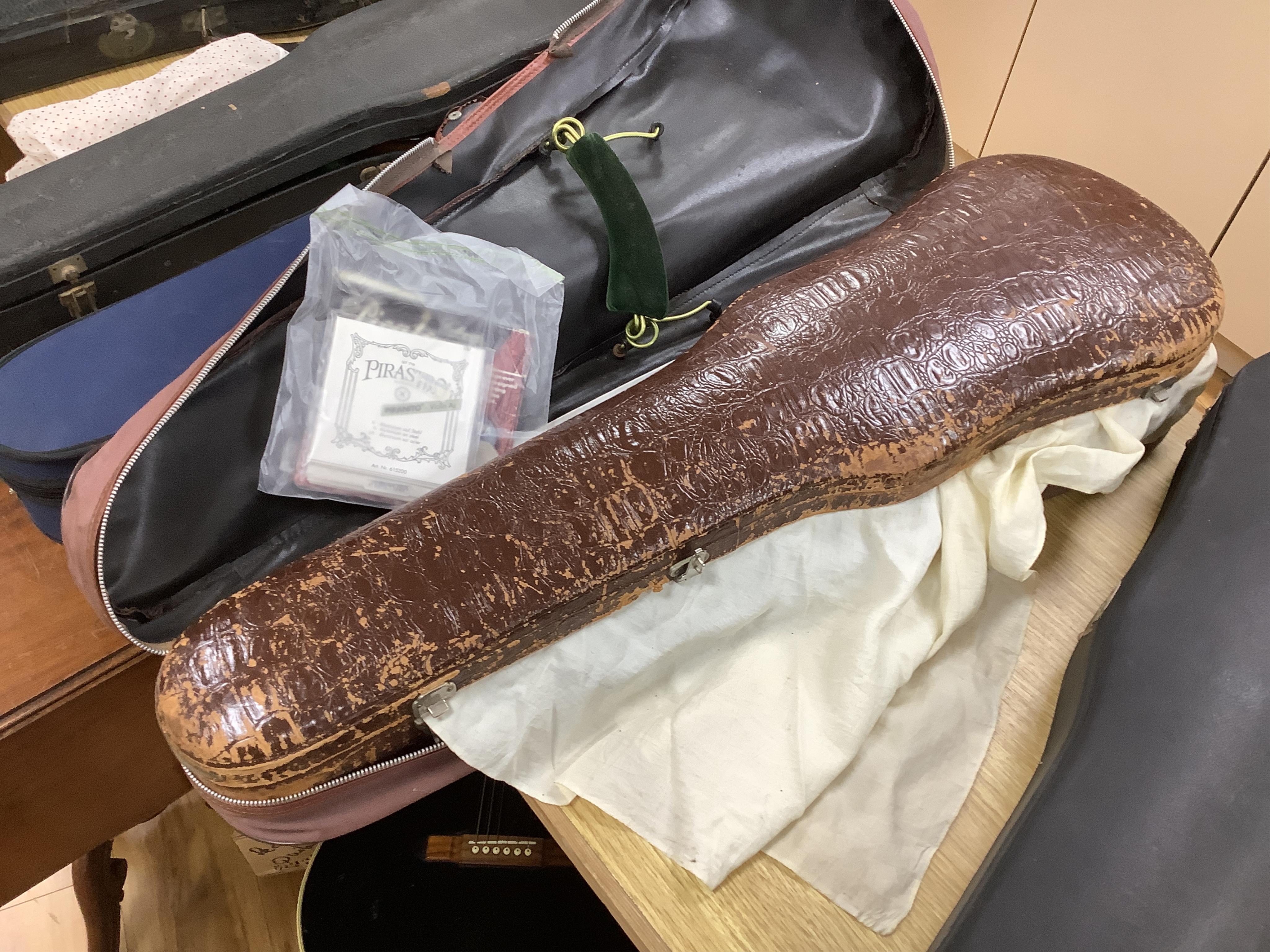 An interesting late 18th century violin, with one piece bird’s eye maple back, unsigned, with two silver fully mounted octagonal bows, one stamped Voight CITES Submission reference, 3XFNUBT7 and Submission reference, RHL